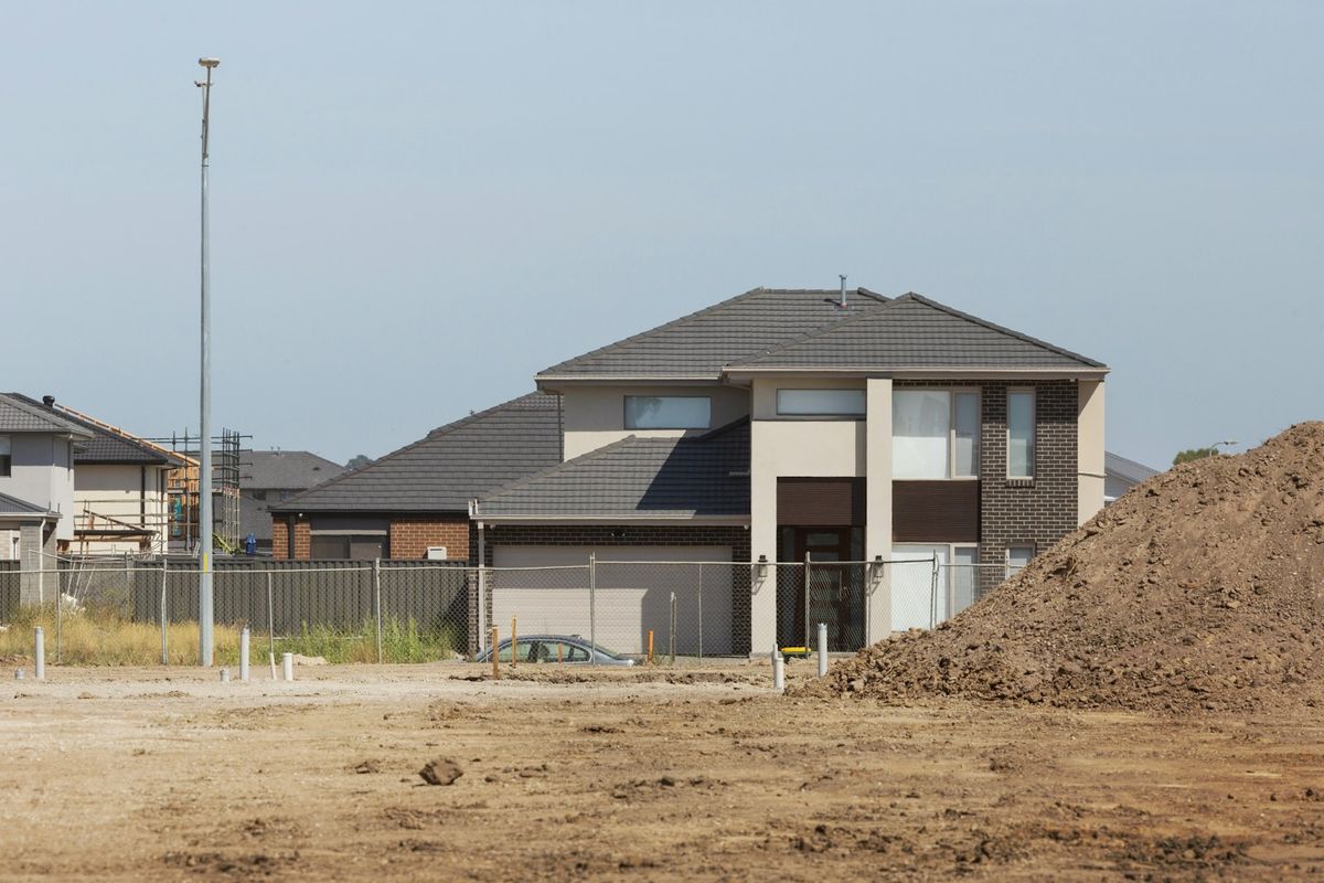 Example of a graded new-construction lot with bare soil, ready for seeding
